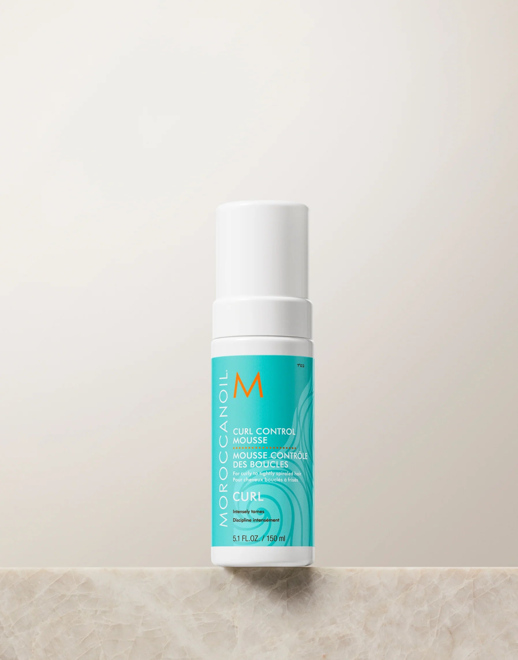 Styling foam for curls (MoroccanOil Curl Control Mousse)