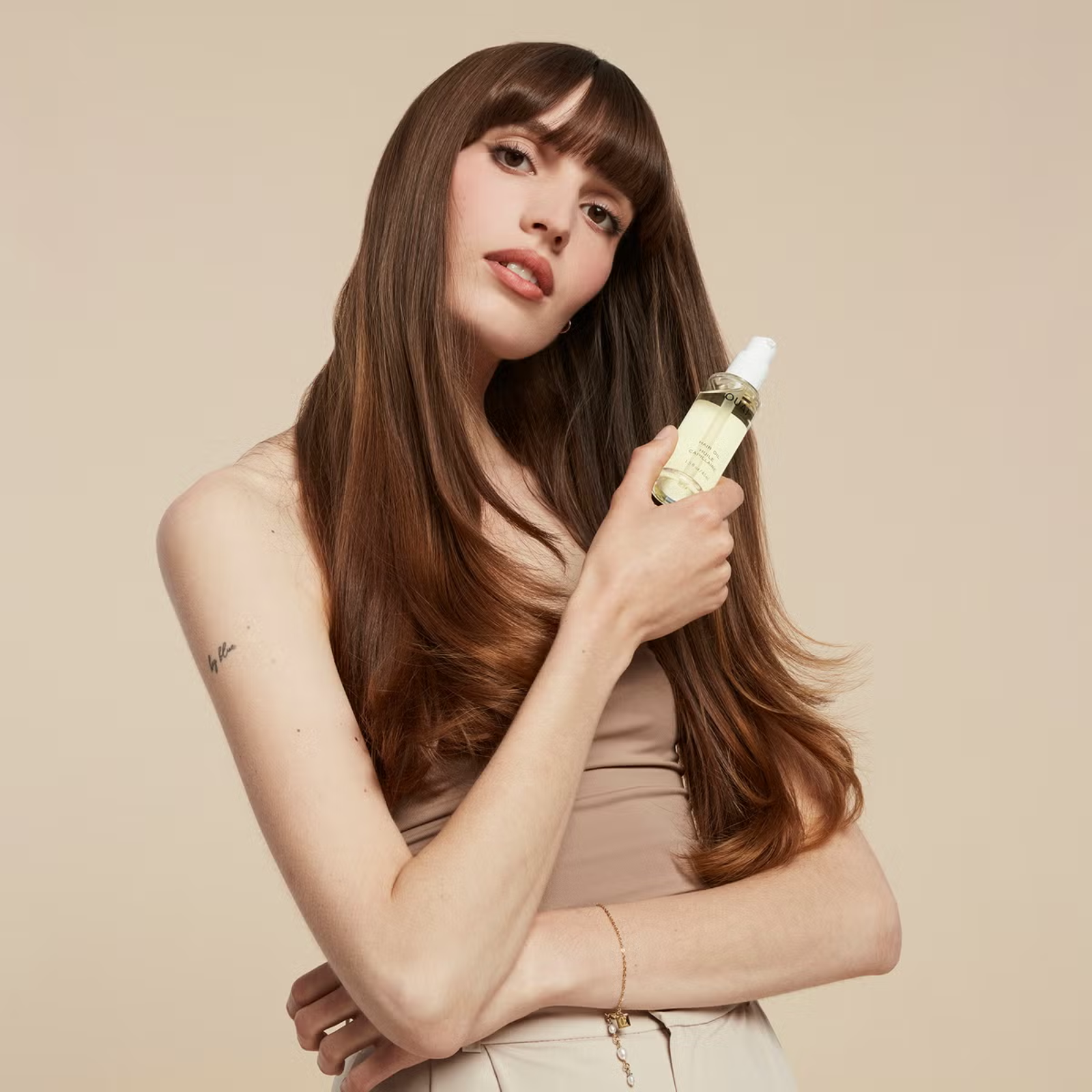 OUAI Hair Oil (Heat protectant oil for frizz control)